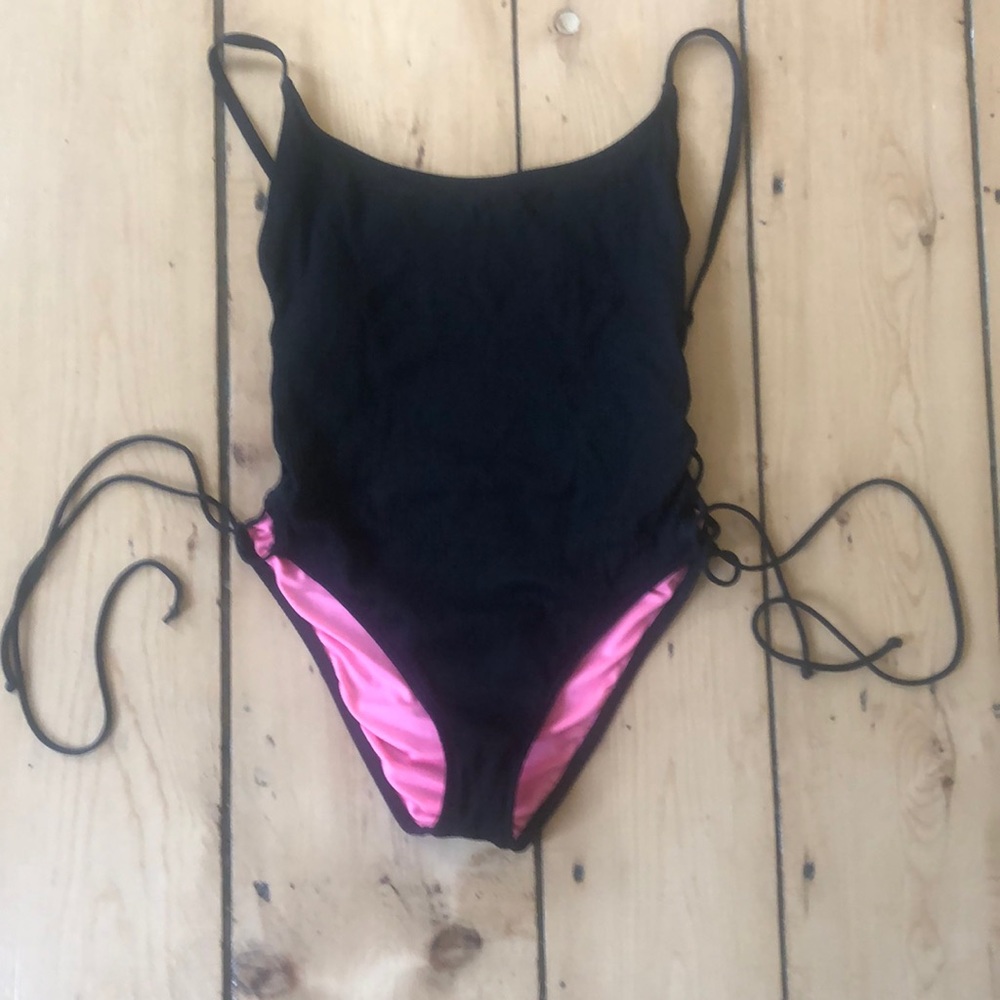 Black One Piece with tie up sides! Very cute